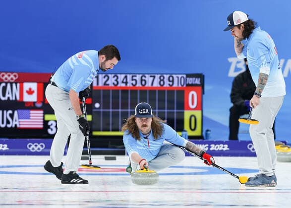 (220218) -- BEIJING, Feb. 18, 2022 -- Matt Hamilton (C) of the United States curls the stone during the curling man s bronze medal game of the Beijing 2022 Winter Olympics between Canada and the United States at the National Aquatics center in Beijing, China, Feb.18, 2022. ) (BEIJING 2022)CHINA-BEIJING-OLYMPIC Winter games, Winterspiele,Spiele, Summer games CURLING-MAN-BRONZE MEDAL-USA vs CAN(CN) WangxJingqiang 