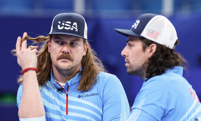 (220218) -- BEIJING, Feb. 18, 2022 -- Matt Hamilton (L) and Christopher Plys of the United States react during the curling man s bronze medal game of the Beijing 2022 Winter Olympics between Canada and the United States at the National Aquatics center in Beijing, China, Feb.18, 2022. ) (BEIJING 2022)CHINA-BEIJING-OLYMPIC Winter games, Winterspiele,Spiele, Summer games CURLING-MAN-BRONZE MEDAL-USA vs CAN(CN) WangxJingqiang 