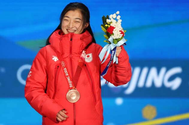 BEIJING, CHINA â€“ FEBRUARY 18, 2022: Figure skater Kaori Sakamoto of Japan poses with her bronze medal at a victory ceremony for the ladies Figure skating, Eiskunstlauf event at the Beijing 2022 Winter Olympic Games, Olympische Spiele, Olympia, OS at the Beijing Medals Plaza. Anton Novoderezhkin TASS  TS124156