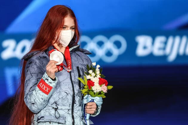 BEIJING, CHINA â€“ FEBRUARY 18, 2022: Figure skater Aleksandra Trusova of Team ROC poses with her silver medal at a victory ceremony for the ladies Figure skating, Eiskunstlauf event at the Beijing 2022 Winter Olympic Games, Olympische Spiele, Olympia, OS at the Beijing Medals Plaza. Anton Novoderezhkin TASS  TS12417E