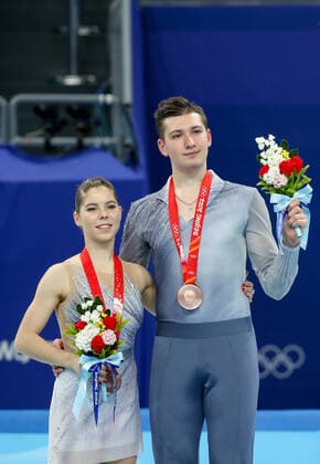 BEIJING, CHINA - FEBRUARY 19, 2022: Bronze medalists Anastasia Mishina and Alexander Gallyamov of Team ROC at a flower ceremony for the pair skating at the 2022 Winter Olympic Games, Olympische Spiele, Olympia, OS at the Capital Indoor Stadium. Valery Sharifulin TASS  TS12456B