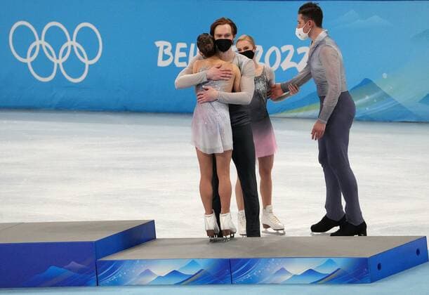 China Olympics 2022 Medal Ceremony 8120831 19.02.2022 Silver medalists Russian Olympic Committee s Evgenia Tarasova and Vladimir Morozov and bronze medalists Russian Olympic Committee s Anastasia Mishima and Aleksandr Galliamov congratulate each other during the medal ceremony for the pairs Figure skating, Eiskunstlauf event during the Beijing 2022 Winter Olympic Games, Olympische Spiele, Olympia, OS at Capital Indoor Stadium in Beijing, China. Alexander Vilf Sputnik Beijing China  Copyright: xAlexanderxVilfx