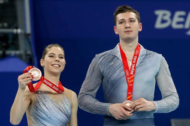 BEIJING, CHINA - FEBRUARY 19, 2022: Bronze medalists Anastasia Mishina and Alexander Gallyamov of Team ROC at a flower ceremony for the pair skating at the 2022 Winter Olympic Games, Olympische Spiele, Olympia, OS at the Capital Indoor Stadium. Valery Sharifulin TASS  TS12458B