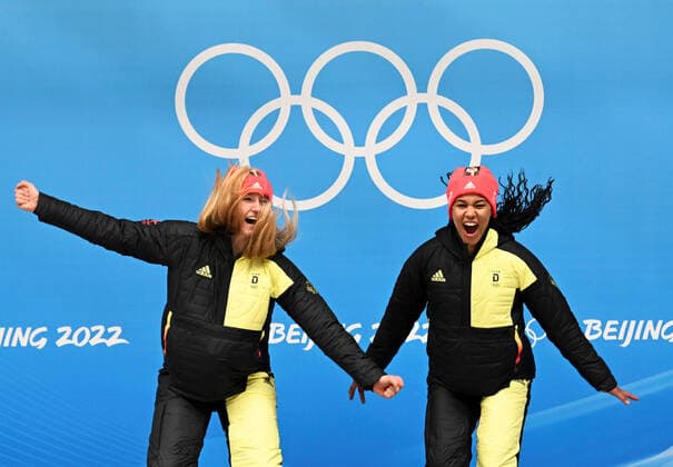 (220219) -- BEIJING, Feb. 19, 2022 -- Gold medalists Laura Nolte (L) and Deborah Levi of Germany celebrate on the podium during the awarding ceremony for the bobsleigh 2-woman heat of Beijing 2022 Winter Olympics at National Sliding Centre in Yanqing District, Beijing, capital of China, Feb. 19, 2022. ) (BEIJING2022)CHINA-BEIJING-OLYMPIC Winter games, Winterspiele,Spiele, Summer games BOBSLEIGH-2-WOMEN-HEAT (CN) HexChangshan 