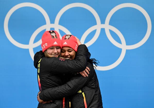 (220219) -- BEIJING, Feb. 19, 2022 -- Gold medalists Laura Nolte (L) and Deborah Levi of Germany celebrate on the podium during the awarding ceremony for the bobsleigh 2-woman heat of Beijing 2022 Winter Olympics at National Sliding Centre in Yanqing District, Beijing, capital of China, Feb. 19, 2022. ) (BEIJING2022)CHINA-BEIJING-OLYMPIC Winter games, Winterspiele,Spiele, Summer games BOBSLEIGH-2-WOMEN-HEAT (CN) HexChangshan 