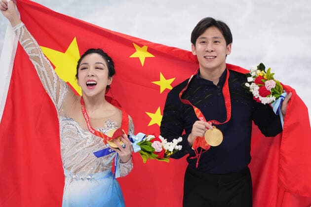 Wenjing Sui and Cong Han of China, pose with their gold medals after winning the Pairs Figure skating, Eiskunstlauf competition in the Capital Indoor Stadium at the Beijing 2022 Winter Olympic on Saturday, February 19, 2022. Wenjing Sui and Cong Han of China, won the gold, Evgenia Tarasova and Vladimir Morozov of Russia, the silver medal and Anastasia Mishina and Aleksandr Galliamov, of Russia the bronze.  OLY20220219040 RICHARDxELLIS