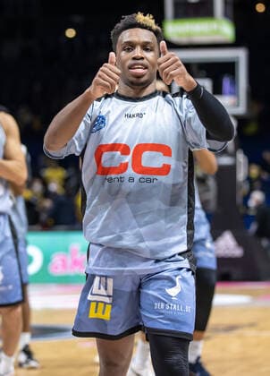 19 02 2022, Berlin, basketball, BBL Cup, semifinals, Final Four, Mercedes Benz Arena Basketball Loewen Braunschweig HAKRO Merlins Crailsheim T J Shorts by HAKRO Merlins Crailsheim cheers after winning the semifinals Loewen Braunschweig Merlins Crailsheim