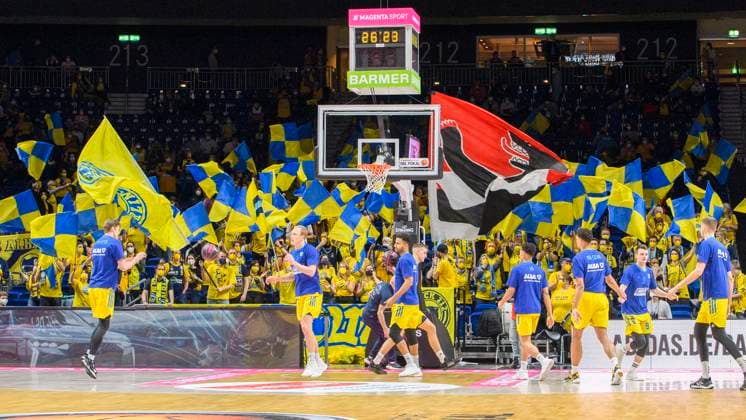 Alba fan block in yellow blue before the game, GER, Basketball,Alba Berlin vs Chemnitz Niners, BBL, Basketball 1 Bundesliga Maenner, Pokal Top Four 2022, Spiel ums Halbfinale, Saison 2021 2022, 19 02 2022, Basketball Alba Berlin vs Chemnitz Niners, BBL, Pokal Top Four 2022, Spiel ums Halbfinale, Basketball 1 Bundesliga Maenner, , Saison 2021 2022, 19 02 2022, Berlin Copyright: xEibner-Pressefoto UwexKochx EP_UKH