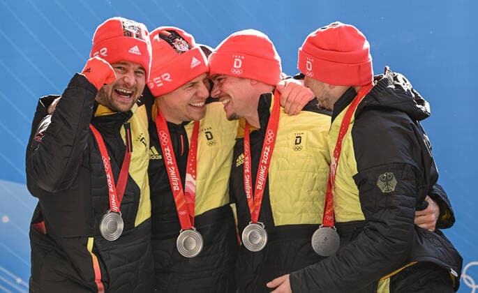 (220220) -- BEIJING, Feb. 20, 2022 -- Johannes Lochner Florian Bauer Christopher Weber Christian Ras of Germany attend the awarding ceremony after the bobsleigh 4-man heat of Beijing 2022 Winter Olympics at National Sliding Centre in Yanqing District, Beijing, capital of China, Feb. 20, 2022. ) (XHTP)(BEIJING2022)CHINA-BEIJING-OLYMPIC Winter games, Winterspiele,Spiele, Summer games BOBSLEIGH-4-MEN-HEAT(CN) SunxFei 