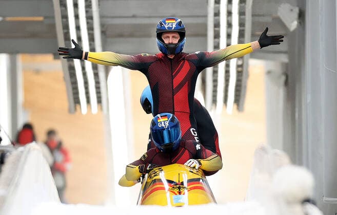 (220220) -- BEIJING, Feb. 20, 2022 -- Francesco Friedrich Thorsten Margis Candy Bauer Alexander Schueller of Germany react after the bobsleigh 4-man heat of Beijing 2022 Winter Olympics at National Sliding Centre in Yanqing District, Beijing, capital of China, Feb. 20, 2022. ) (XHTP)(BEIJING2022)CHINA-BEIJING-OLYMPIC Winter games, Winterspiele,Spiele, Summer games BOBSLEIGH-4-MEN-HEAT(CN) YaoxJianfeng 