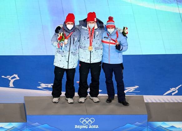 China Olympics 2022 Closing 8121754 20.02.2022 From left, silver medalist Russian Olympic Committee s Ivan Yakimushkin, gold medalist Russian Olympic Committee s Alexander Bolshunov and bronze medalist Norway s Simen Heisted Krueger pose during an award ceremony for the cross-country skiing men s 50 km mass start free event during the closing ceremony of the Beijing 2022 Winter Olympic Games, Olympische Spiele, Olympia, OS at the National Stadium, also known as the Bird s Nest, in Beijing, China. Vladimir Astapkovich Sputnik Beijing China  Copyright: xVladimirxAstapkovichx