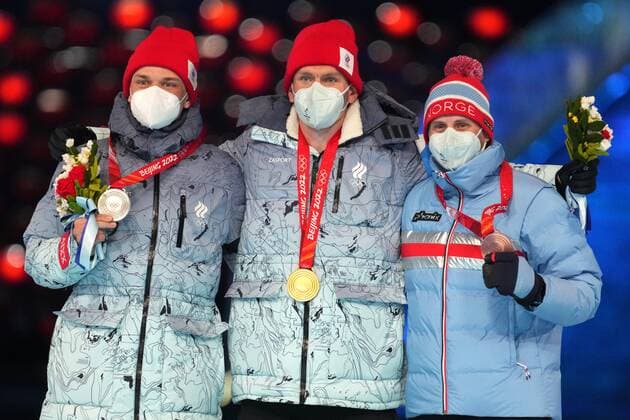 China Olympics 2022 Closing 8121755 20.02.2022 From left, silver medalist Russian Olympic Committee s Ivan Yakimushkin, gold medalist Russian Olympic Committee s Alexander Bolshunov and bronze medalist Norway s Simen Heisted Krueger pose during an award ceremony for the cross-country skiing men s 50 km mass start free event during the closing ceremony of the Beijing 2022 Winter Olympic Games, Olympische Spiele, Olympia, OS at the National Stadium, also known as the Bird s Nest, in Beijing, China. Pavel Bednyakov Sputnik Beijing China  Copyright: xPavelxBednyakovx