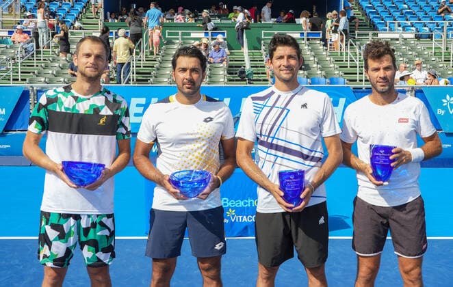 February 20, 2022, Delray Beach, Florida, United States: February, 20 - Delray Beach: Marcelo Arevalo(ESP) Jean-Julien Rojer(NED) pose with the Champions trophy after defeating Aleksandr Nedovyesov(KAZ) Aisam-Ul-Haq Qureshi(PAK) 62 67(5) 10-4 during the 2022 Delray Beach Open by Vitacost Doubles Championship.e Delray Beach United States - ZUMApa3_ 0151547816st Copyright: xAndrewxPatronx
