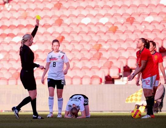 The Riverside Stadium, Middlesbr Patri Guijarro (Spain, 12) receives a yellow card for a foul on Giulia Gwinn (Germany, 15) during the Arnold Clark Cup match between Spain and Germany at The Riverside Stadium in Middlesbrough, England Arnold Clark Cup Alex Todd SPP Spain v Germany 