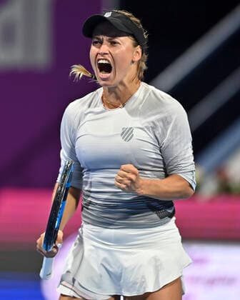 (220221) -- DOHA, Feb. 21, 2022 -- Yulia Putintseva of Kazakhstan reacts during the first round of WTA, Tennis Damen Qatar Open tennis tournament match against Victoria Azarenka of Belarus at the Khalifa International Tennis Complex in Doha, capital of Qatar, on Feb. 20, 2022. (Photo by Nikku Xinhua) (SP)QATAR-DOHA-TENNIS-WTA QATAR OPEN yangyuanyong 