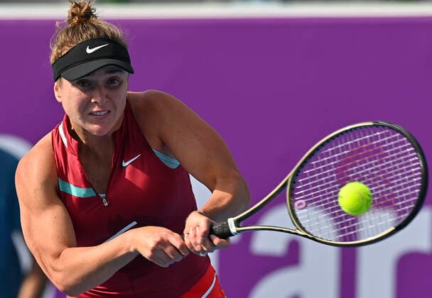 (220222) -- DOHA, Feb. 22, 2022 -- Elina Svitolina of Ukraine hits a return during the first round of WTA, Tennis Damen Qatar Open tennis tournament match against Tereza Martincova of Czech Republic at the Khalifa International Tennis Complex in Doha, capital of Qatar, on Feb. 21, 2022. (Photo by Nikku Xinhua) (SP)QATAR-DOHA-TENNIS-WTA QATAR OPEN yangyuanyong 