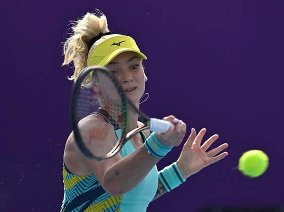 (220222) -- DOHA, Feb. 22, 2022 -- Tereza Martincova of Czech Republic hits a return during the first round of WTA, Tennis Damen Qatar Open tennis tournament match against Elina Svitolina of Ukraine at the Khalifa International Tennis Complex in Doha, capital of Qatar, on Feb. 21, 2022. (Photo by Nikku Xinhua) (SP)QATAR-DOHA-TENNIS-WTA QATAR OPEN yangyuanyong 