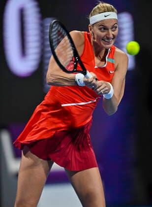 (220222) -- DOHA, Feb. 22, 2022 -- Petra Kvitova of the Czech Republic returns the ball during the first round of WTA, Tennis Damen Qatar Open tennis tournament match against Irina-Camelia Begu of Romania at the Khalifa International Tennis Complex in Doha, capital of Qatar, on Feb. 21, 2022. (Photo by Nikku Xinhua) (SP)QATAR-DOHA-TENNIS-WTA QATAR OPEN yangyuanyong 