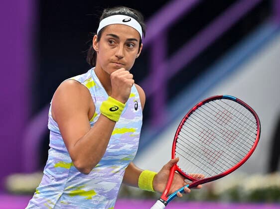 (220222) -- DOHA, Feb. 22, 2022 -- Caroline Garcia of France celebrates during the first round of WTA, Tennis Damen Qatar Open tennis tournament match against Simona Halep of Romania at the Khalifa International Tennis Complex in Doha, capital of Qatar, on Feb. 21, 2022. (Photo by Nikku Xinhua) (SP)QATAR-DOHA-TENNIS-WTA QATAR OPEN yangyuanyong 