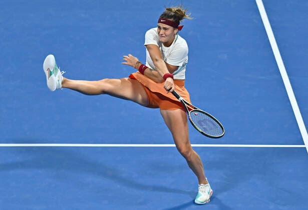 (220223) -- DOHA, Feb. 23, 2022 -- Aryna Sabalenka of Belarus returns the ball during the second round of WTA, Tennis Damen Qatar Open tennis tournament match against Aliz Cornet of France at the Khalifa International Tennis Complex in Doha, capital of Qatar, on Feb. 22, 2022. (Photo by Nikku Xinhua) (SP)QATAR-DOHA-TENNIS-WTA QATAR OPEN-DAY 5 yangyuanyong 