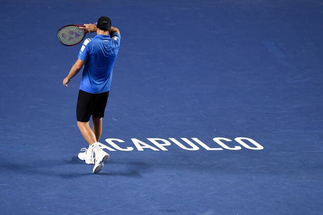 (220223) -- ACAPULCO, Feb. 23, 2022 -- Denis Kudla of the United States reacts during the men s singles first round match against Rafael Nadal of Spain at the 2022 ATP, Tennis Herren Mexican Open tennis tournament in Acapulco, Mexico, Feb. 22, 2022. ) (SP)MEXICO-ACAPULCO-TENNIS-ATP-MEXICAN OPEN-FIRST ROUND XinxYuewei 