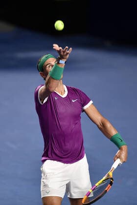 (220223) -- ACAPULCO, Feb. 23, 2022 -- Rafael Nadal of Spain serves during the men s singles first round match against Denis Kudla of the United States at the 2022 ATP, Tennis Herren Mexican Open tennis tournament in Acapulco, Mexico, Feb. 22, 2022. ) (SP)MEXICO-ACAPULCO-TENNIS-ATP-MEXICAN OPEN-FIRST ROUND XinxYuewei 