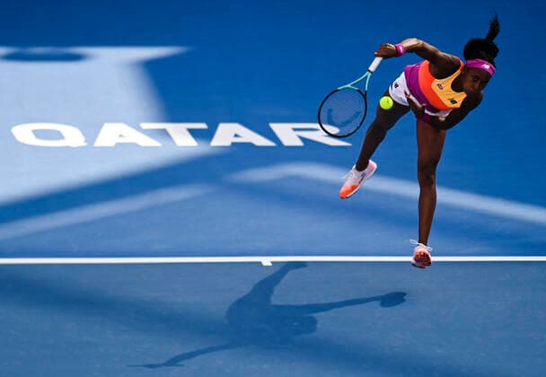 (220223) -- DOHA, Feb. 23, 2022 -- Cori Gauff of the United States serves during the round of 16 match of WTA, Tennis Damen Qatar Open tennis tournament between Cori Gauff of the United States and Paula Badosa of Spain at the Khalifa International Tennis Complex in Doha, capital of Qatar, Feb. 23, 2022. (Photo by Nikku Xinhua) (SP)QATAR-DOHA-TENNIS-QATAR OPEN-ROUND OF 16 yangyuanyong 