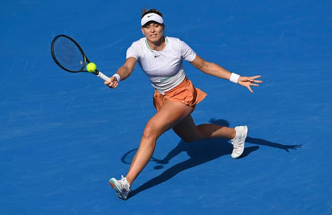 (220223) -- DOHA, Feb. 23, 2022 -- Paula Badosa of Spain hits a return during the round of 16 match of WTA, Tennis Damen Qatar Open tennis tournament between Cori Gauff of the United States and Paula Badosa of Spain at the Khalifa International Tennis Complex in Doha, capital of Qatar, Feb. 23, 2022. (Photo by Nikku Xinhua) (SP)QATAR-DOHA-TENNIS-QATAR OPEN-ROUND OF 16 yangyuanyong 