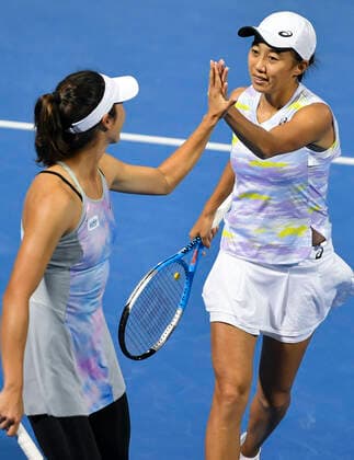 (220224) -- DOHA, Feb. 24, 2022 -- Zhang Shuai (R) of China and Ena Shibahara of Japan react during the doubles quarterfinal of WTA, Tennis Damen Qatar Open tennis tournament match between Zhang Shuai of China Ena Shibahara of Japan and Cori Gauff Jessica Pegula of the United States at the Khalifa International Tennis Complex in Doha, capital of Qatar, Feb.23, 2022. (Photo by Xinhua) (SP)QATAR-DOHA-TENNIS-QATAR OPEN-DOUBLES QUARTERFINAL Nikku 