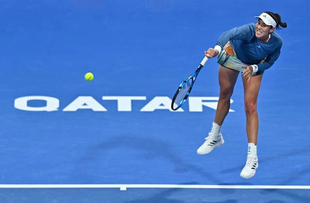(220224) -- DOHA, Feb. 24, 2022 -- Garbine Muguruza of Spain serves during the round of 16 match of WTA, Tennis Damen Qatar Open tennis tournament between Garbine Muguruza of Spain and Madison Brengle of the United States at the Khalifa International Tennis Complex in Doha, capital of Qatar, Feb. 23, 2022. (Photo by Xinhua) (SP)QATAR-DOHA-TENNIS-QATAR OPEN-ROUND OF 16 Nikku 