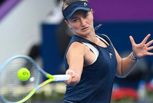 (220224) -- DOHA, Feb. 24, 2022 -- Barbora Krejcikova of the Czech Republic hits a return during the round of 16 match of WTA, Tennis Damen Qatar Open tennis tournament between Jelena Ostapenko of Latvia and Barbora Krejcikova of the Czech Republic at the Khalifa International Tennis Complex in Doha, capital of Qatar, on Feb. 23, 2022. (Photo by Xinhua) (SP)QATAR-DOHA-TENNIS-QATAR OPEN-ROUND OF 16 Nikku 