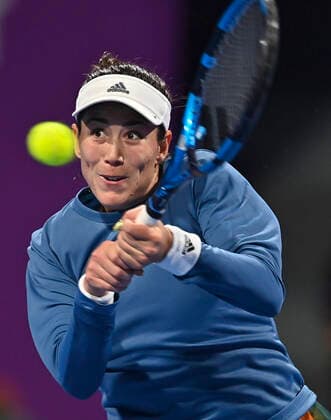 (220224) -- DOHA, Feb. 24, 2022 -- Garbine Muguruza of Spain hits a return during the round of 16 match of WTA, Tennis Damen Qatar Open tennis tournament between Garbine Muguruza of Spain and Madison Brengle of the United States at the Khalifa International Tennis Complex in Doha, capital of Qatar, Feb. 23, 2022. (Photo by Xinhua) (SP)QATAR-DOHA-TENNIS-QATAR OPEN-ROUND OF 16 Nikku 