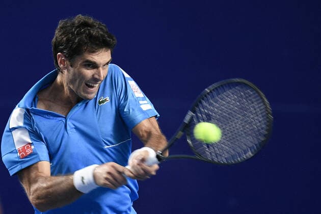 (220224) -- ACAPULCO, Feb. 24, 2022 -- Pablo Andujar of Spain hits a return during the men s singles round of 16 match between Daniil Medvedev of Russia and Pablo Andujar of Spain at the 2022 ATP, Tennis Herren Mexican Open tennis tournament in Acapulco, Mexico, Feb. 23, 2022. ) (SP)MEXICO-ACAPULCO-TENNIS-ATP-MEXICAN OPEN-ROUND OF 16 XinxYuewei 