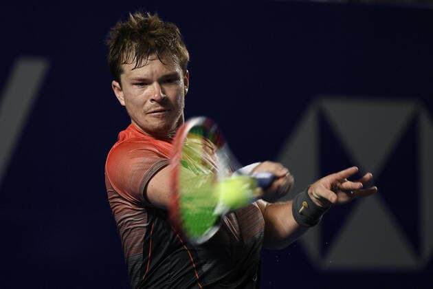 (220224) -- ACAPULCO, Feb. 24, 2022 -- Stefan Kozlov of the United States hits a return during the men s singles round of 16 match against Rafael Nadal of Spain at the 2022 ATP, Tennis Herren Mexican Open tennis tournament in Acapulco, Mexico, Feb. 23, 2022. ) (SP)MEXICO-ACAPULCO-TENNIS-ATP-MEXICAN OPEN-ROUND OF 16 XinxYuewei 