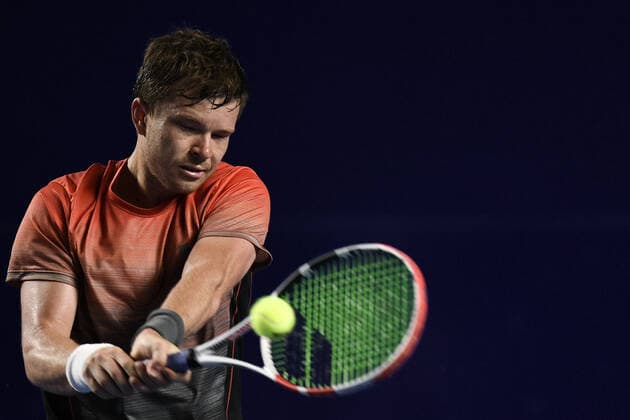 (220224) -- ACAPULCO, Feb. 24, 2022 -- Stefan Kozlov of the United States hits a return during the men s singles round of 16 match against Rafael Nadal of Spain at the 2022 ATP, Tennis Herren Mexican Open tennis tournament in Acapulco, Mexico, Feb. 23, 2022. ) (SP)MEXICO-ACAPULCO-TENNIS-ATP-MEXICAN OPEN-ROUND OF 16 XinxYuewei 