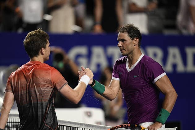 (220224) -- ACAPULCO, Feb. 24, 2022 -- Rafael Nadal (R) of Spain greets his opponent after winning the men s singles round of 16 match against Stefan Kozlov of the United States at the 2022 ATP, Tennis Herren Mexican Open tennis tournament in Acapulco, Mexico, Feb. 23, 2022. ) (SP)MEXICO-ACAPULCO-TENNIS-ATP-MEXICAN OPEN-ROUND OF 16 XinxYuewei 