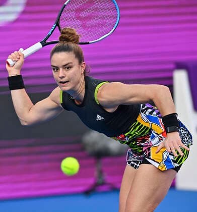 (220224) -- DOHA, Feb. 24, 2022 -- Maria Sakkari of Greece hits a return during the quarterfinal match of WTA, Tennis Damen Qatar Open tennis tournament between Maria Sakkari of Greece and Cori Gauff of the United States at the Khalifa International Tennis Complex in Doha, capital of Qatar, Feb. 24, 2022. (Photo by Nikku Xinhua) (SP)QATAR-DOHA-TENNIS-QATAR OPEN-QUARTERFINAL yangyuanyong 