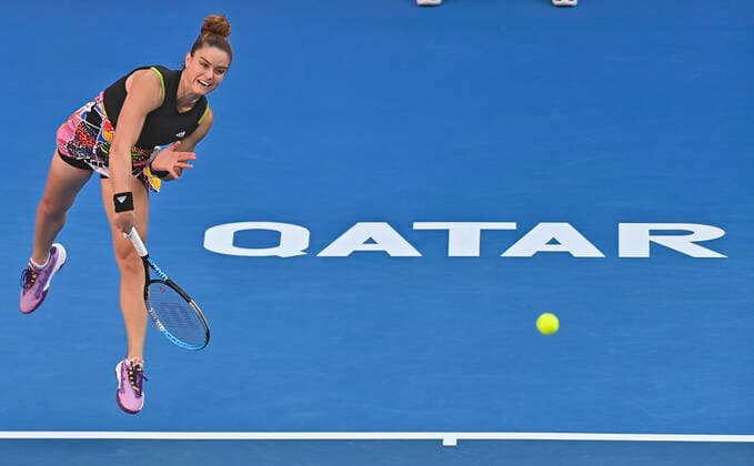 (220224) -- DOHA, Feb. 24, 2022 -- Maria Sakkari of Greece serves during the quarterfinal match of WTA, Tennis Damen Qatar Open tennis tournament between Maria Sakkari of Greece and Cori Gauff of the United States at the Khalifa International Tennis Complex in Doha, capital of Qatar, Feb. 24, 2022. (Photo by Nikku Xinhua) (SP)QATAR-DOHA-TENNIS-QATAR OPEN-QUARTERFINAL yangyuanyong 
