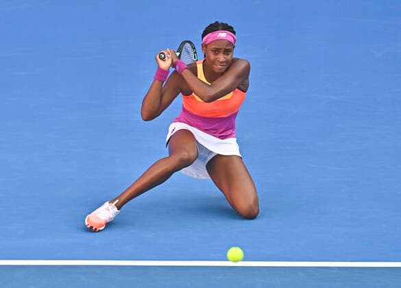 (220224) -- DOHA, Feb. 24, 2022 -- Cori Gauff of the United States hits a return during the quarterfinal match of WTA, Tennis Damen Qatar Open tennis tournament between Maria Sakkari of Greece and Cori Gauff of the United States at the Khalifa International Tennis Complex in Doha, capital of Qatar, Feb. 24, 2022. (Photo by Nikku Xinhua) (SP)QATAR-DOHA-TENNIS-QATAR OPEN-QUARTERFINAL yangyuanyong 