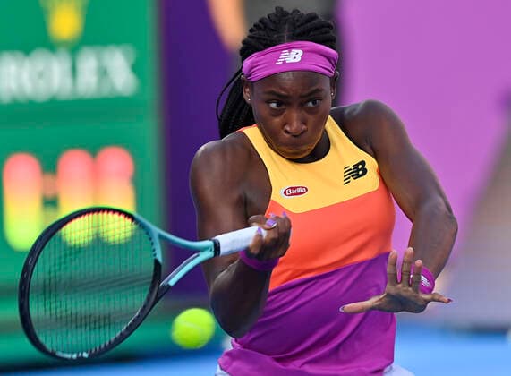 (220224) -- DOHA, Feb. 24, 2022 -- Cori Gauff of the United States hits a return during the quarterfinal match of WTA, Tennis Damen Qatar Open tennis tournament between Maria Sakkari of Greece and Cori Gauff of the United States at the Khalifa International Tennis Complex in Doha, capital of Qatar, Feb. 24, 2022. (Photo by Nikku Xinhua) (SP)QATAR-DOHA-TENNIS-QATAR OPEN-QUARTERFINAL yangyuanyong 