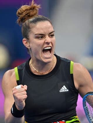 (220224) -- DOHA, Feb. 24, 2022 -- Maria Sakkari of Greece celebrates after the quarterfinal match of WTA, Tennis Damen Qatar Open tennis tournament between Maria Sakkari of Greece and Cori Gauff of the United States at the Khalifa International Tennis Complex in Doha, capital of Qatar, Feb. 24, 2022. (Photo by Nikku Xinhua) (SP)QATAR-DOHA-TENNIS-QATAR OPEN-QUARTERFINAL yangyuanyong 