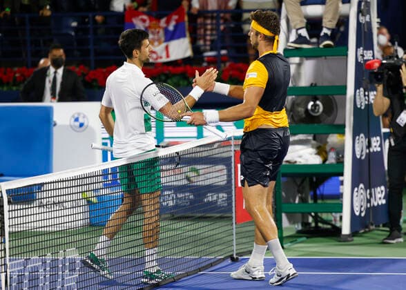 Novak Djokovic congratulates the winner Jiri Vesely Tennis Dubai Duty Free Tennis Championships ATP Dubai Duty Free Tennis Stadium Dubai United Arab Emirates 24 February 2022 Copyright: xJuergenxHasenkopfx
