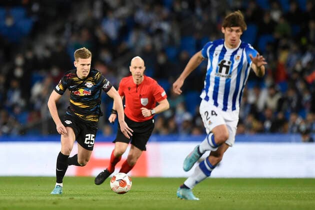 ESP: Real Sociedad - RB Leipzig. UEFA Europa League Dani Olmo of RB Leipzig and Robin Le Normand of Real Sociedad during the UEFA Europa League match, round of 32 between Real Sociedad v RB Leipzig played at Reale Arena Stadium on February 24, 2022 in San Sebastian, Spain. (Cesar Ortiz PRESSINPHOTO) kpng Copyright: xCesarxOrtizx xPRESSINPHOTOx PS_220224_008