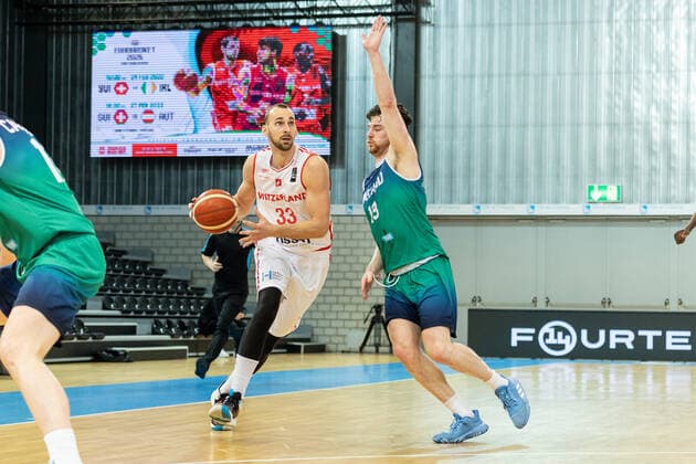 24 02 2022, Fribourg, Hall St Leonard, FIBA Men x92 s EuroBasket 2025 Pre Qualification Switzerland Ireland, 33 Marko Mladjan Switzerland face Ã 13 Jordan Connor Ireland Fribourg Hall St Leonard Fribourg Switzerland  Copyright: xJustPictures.ch SirianexDavetx