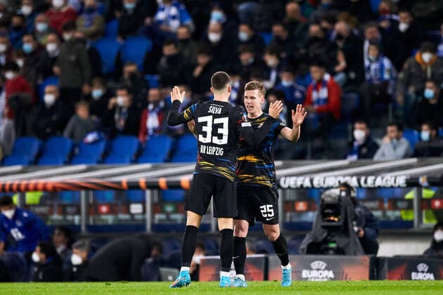 February 24, 2022, SAN SEBASTIAN, GUIPUZCOA, SPAIN: Andre Silva and Dani Olmo of RB Leipzig reacts after scoring goal during the UEFA Europa League Knockout Round Play-Offs Leg One match between, Real Sociedad and RB Leipzig at Reale Arena on 24 of February, 2022 in San Sebastian, Spain. SAN SEBASTIAN SPAIN - ZUMAa181 20220224_zaa_a181_033 Copyright: xRicardoxLarreinax