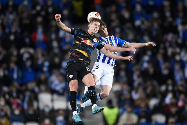 ESP: Real Sociedad - RB Leipzig. UEFA Europa League Dani Olmo of RB Leipzig and Aritz Elustondo of Real Sociedad during the UEFA Europa League match, round of 32 between Real Sociedad v RB Leipzig played at Reale Arena Stadium on February 24, 2022 in San Sebastian, Spain. (Cesar Ortiz PRESSINPHOTO) kpng Copyright: xCesarxOrtizx xPRESSINPHOTOx PS_220224_060