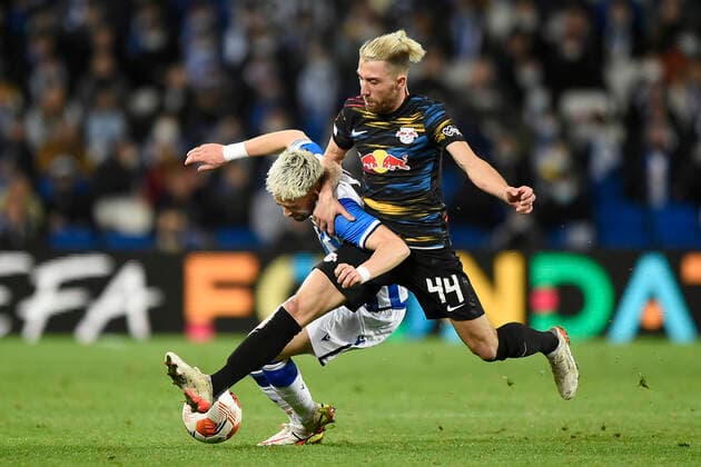 ESP: Real Sociedad - RB Leipzig. UEFA Europa League Kevin Kampl of RB Leipzig and Andan Januzaj of Real Sociedad during the UEFA Europa League match, round of 32 between Real Sociedad v RB Leipzig played at Reale Arena Stadium on February 24, 2022 in San Sebastian, Spain. (Cesar Ortiz PRESSINPHOTO) kpng Copyright: xCesarxOrtizx xPRESSINPHOTOx PS_220224_063