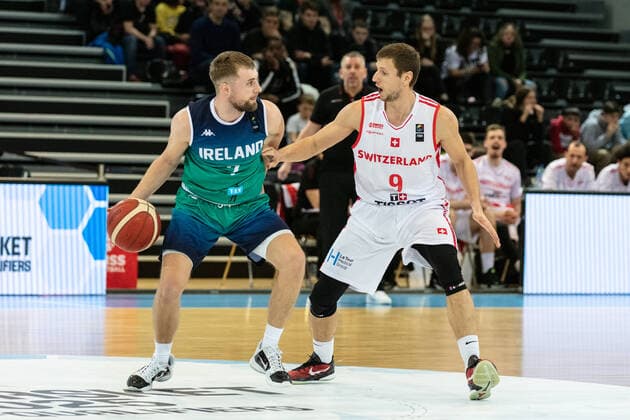 24 02 2022, Fribourg, Hall St Leonard, FIBA Men x92 s EuroBasket 2025 Pre Qualification Switzerland Ireland, 7 Sean Flood Ireland face Ã 9 Roberto Kovac Switzerland Fribourg Hall St Leonard Fribourg Switzerland  Copyright: xJustPictures.ch SirianexDavetx