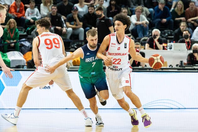 24 02 2022, Fribourg, Hall St Leonard, FIBA Men x92 s EuroBasket 2025 Pre Qualification Switzerland Ireland, 22 Marco Portannese Switzerland face Ã 7 Sean Flood Ireland Fribourg Hall St Leonard Fribourg Switzerland  Copyright: xJustPictures.ch SirianexDavetx