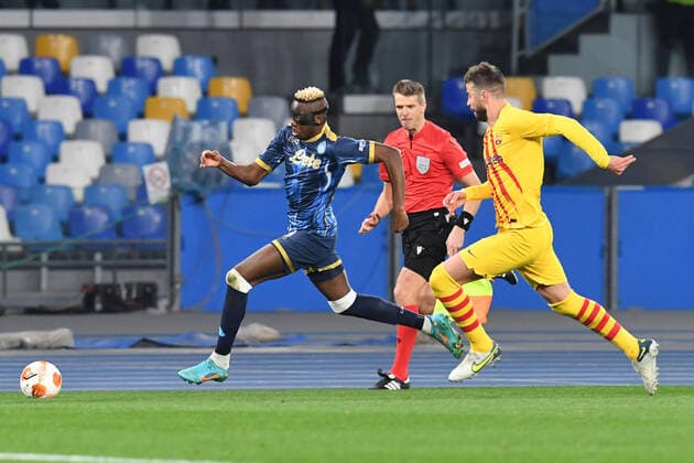 February 24, 2022, NAPLES, italia: Napoli™s forward Victor Osimhen (L) and Barcelona™s defender Gerard Pique™ in action during the UEFA Europa League play-off second leg soccer match between SSC Napoli and FC Barcelona, Barca at Diego Armando Maradona stadium in Naples (Italy) 24 february 2022.ANSA CIRO FUSCO NAPLES italia - ZUMAa110 20220224_zaf_a110_135 Copyright: xCiroxFuscox